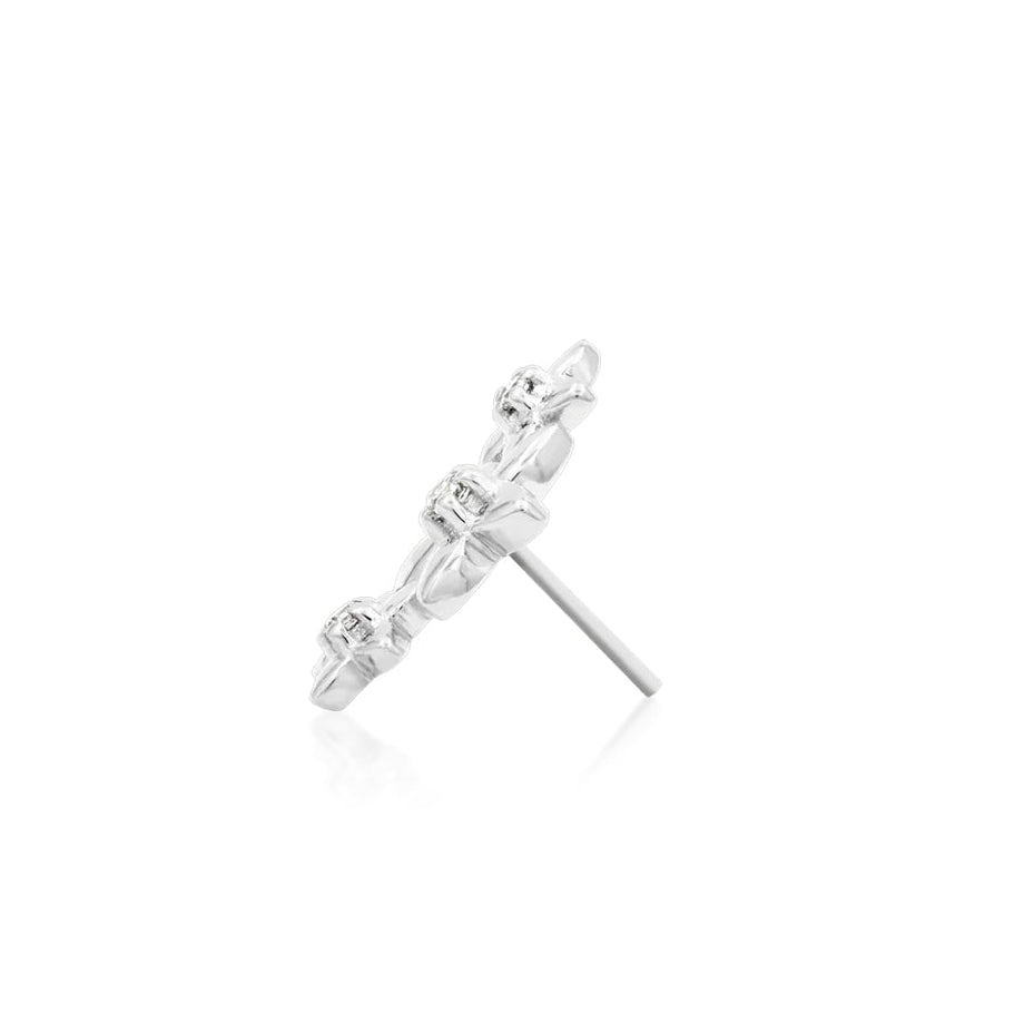 Statement conch earring in solid white gold with a curved 12mm floral CZ arrangement.